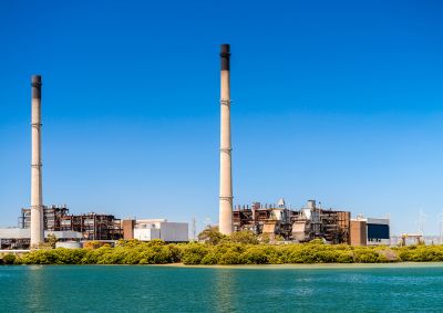 A panoramic view of the Pelican Point gas-fired power plant on a blue sky sunny day